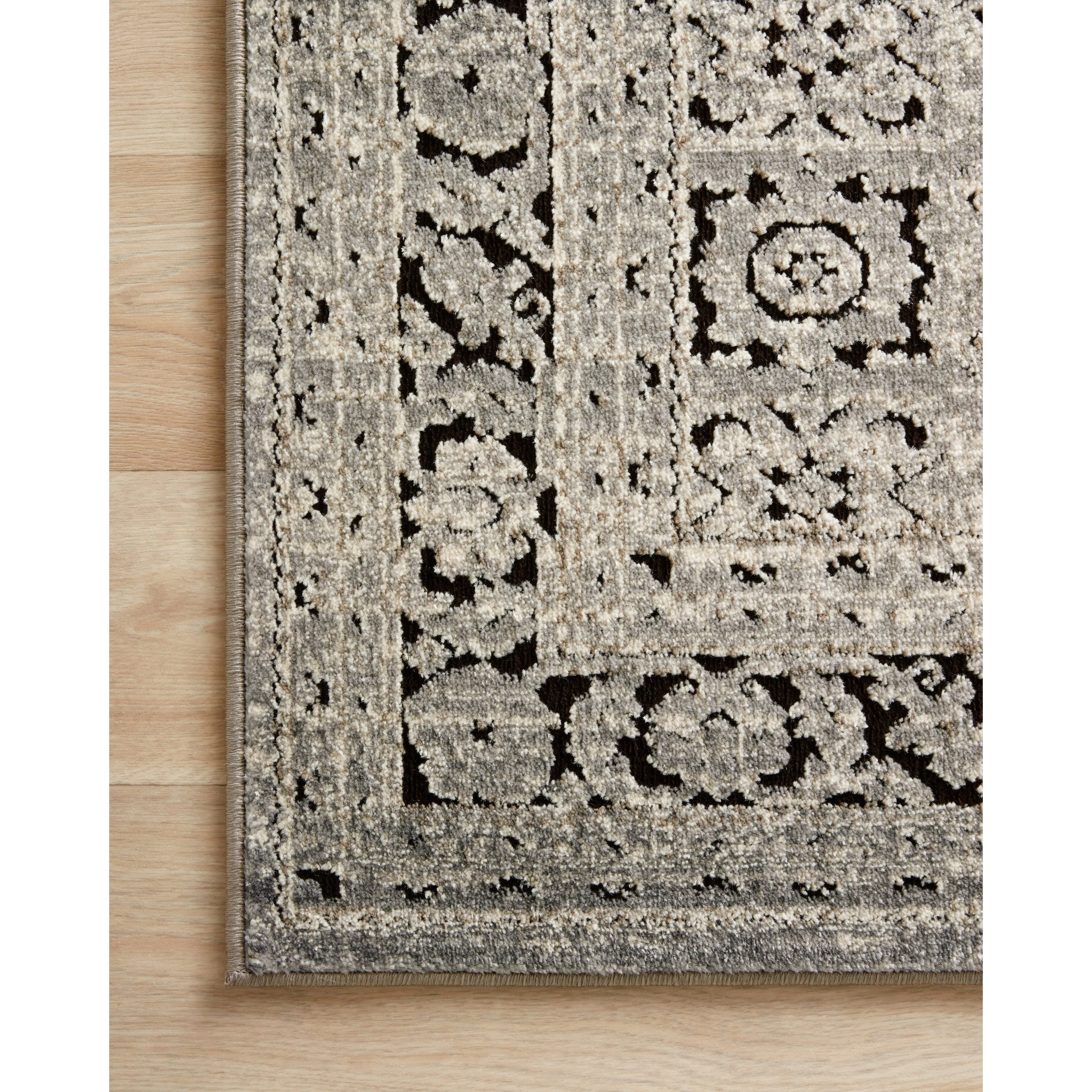 Alexander Home Carissa Distressed Floral Border Area Rug