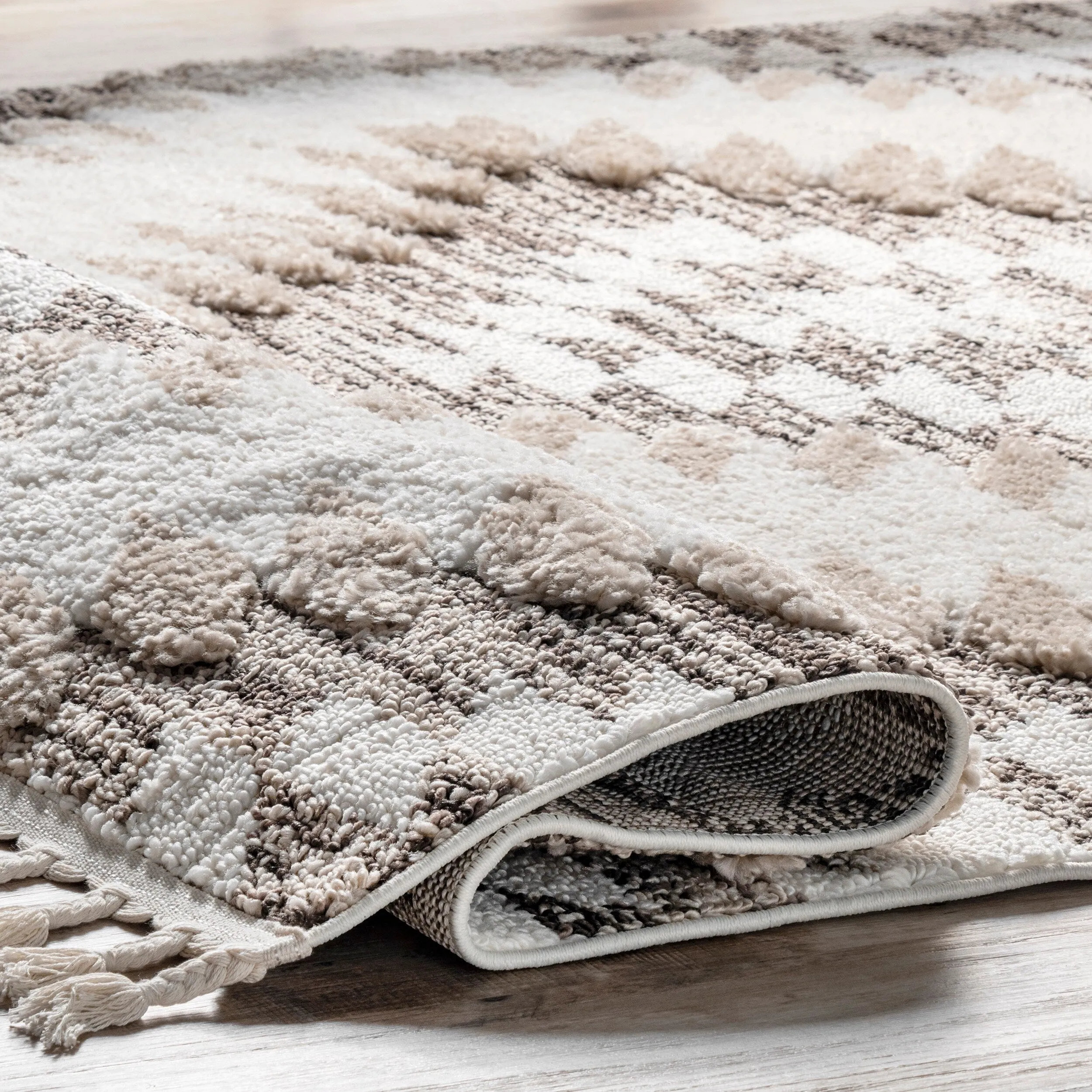 Nuloom Adelade Aztec High Low Shaggy Tassel Area Rug