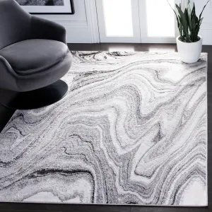 SAFAVIEH. Amelia Jahan Modern Abstract Rug