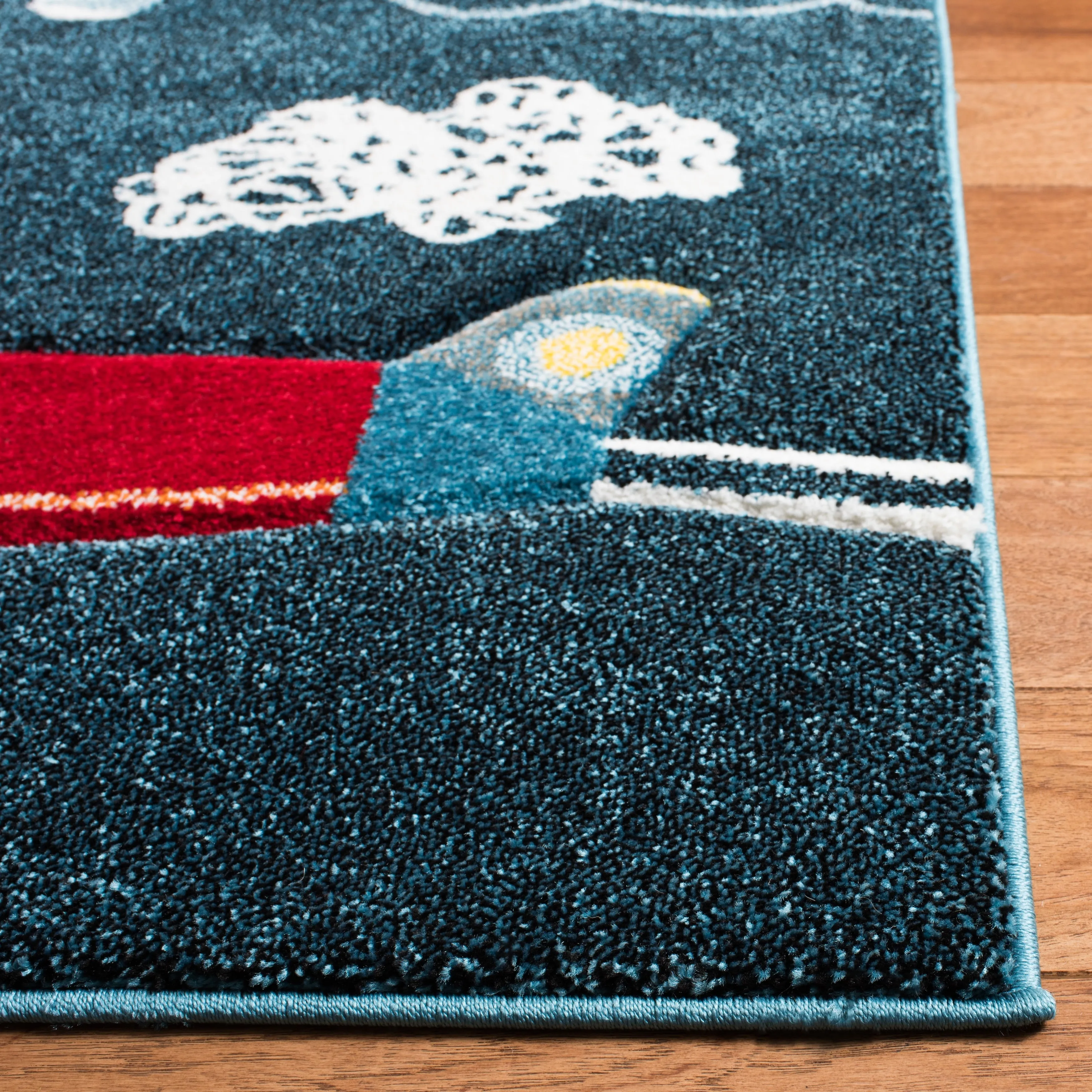 SAFAVIEH Carousel Kids Mindra Airplane Rug