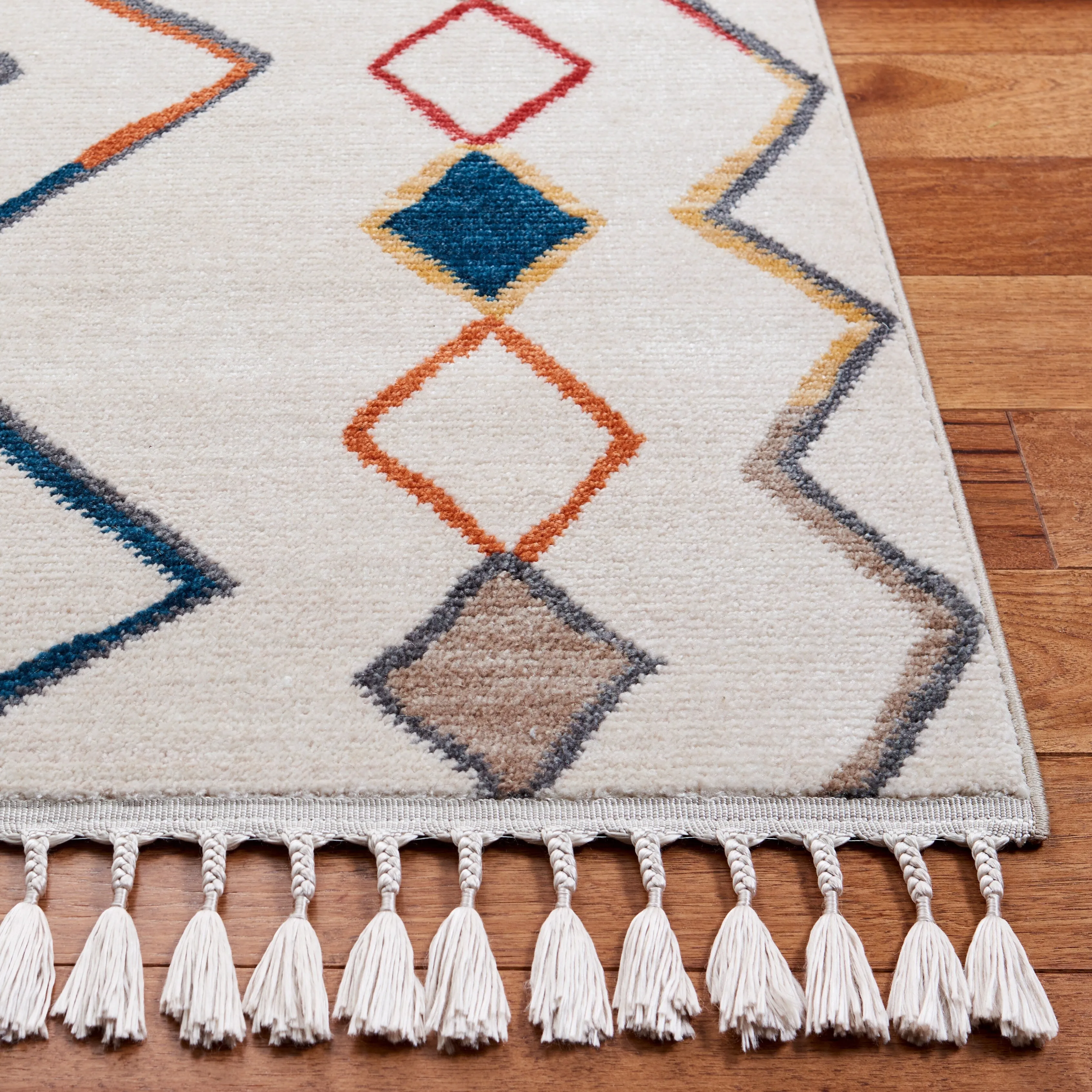 SAFAVIEH Farmhouse Kujtime Moroccan Boho Tassel Rug