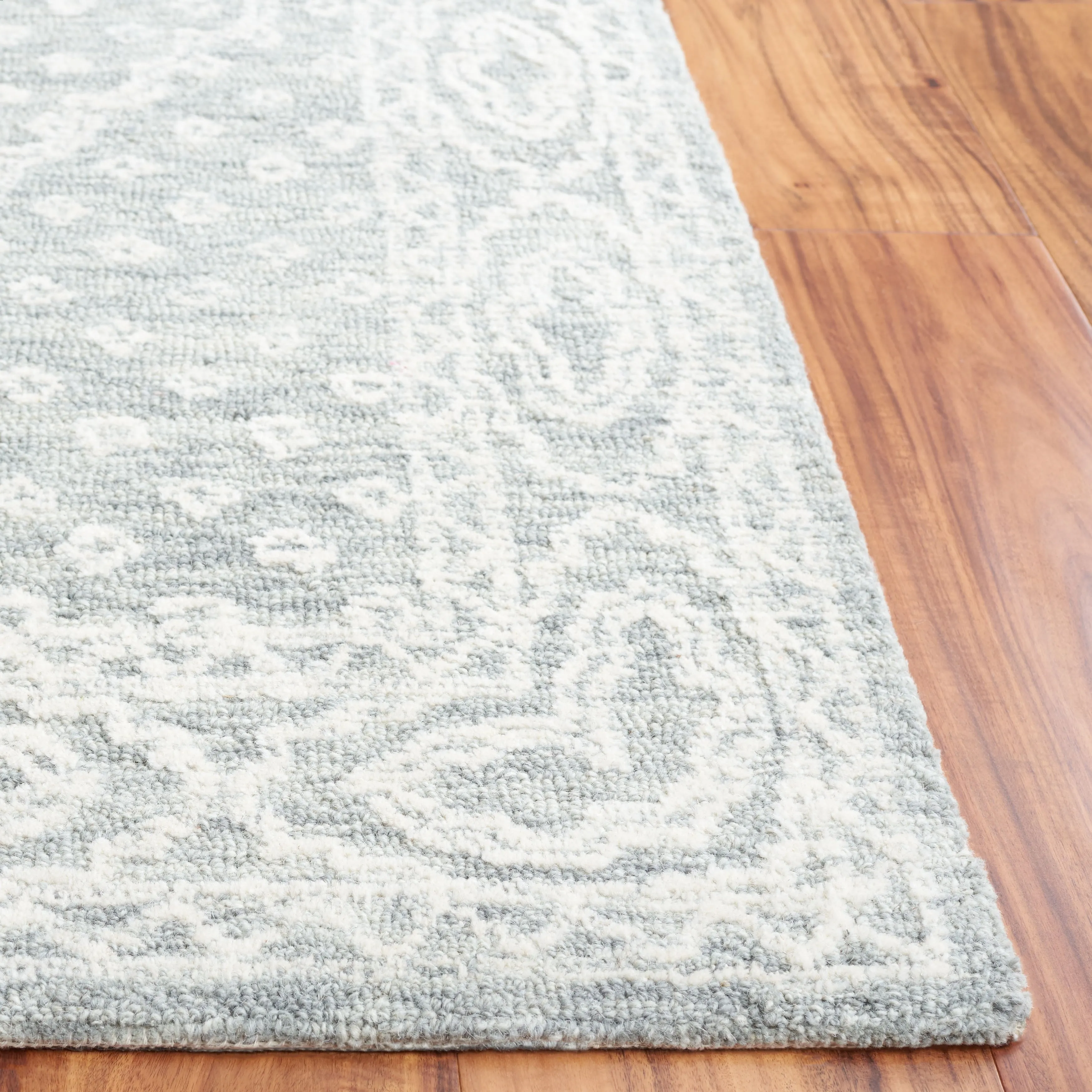SAFAVIEH Handmade Ebony Branddis Modern Wool Rug