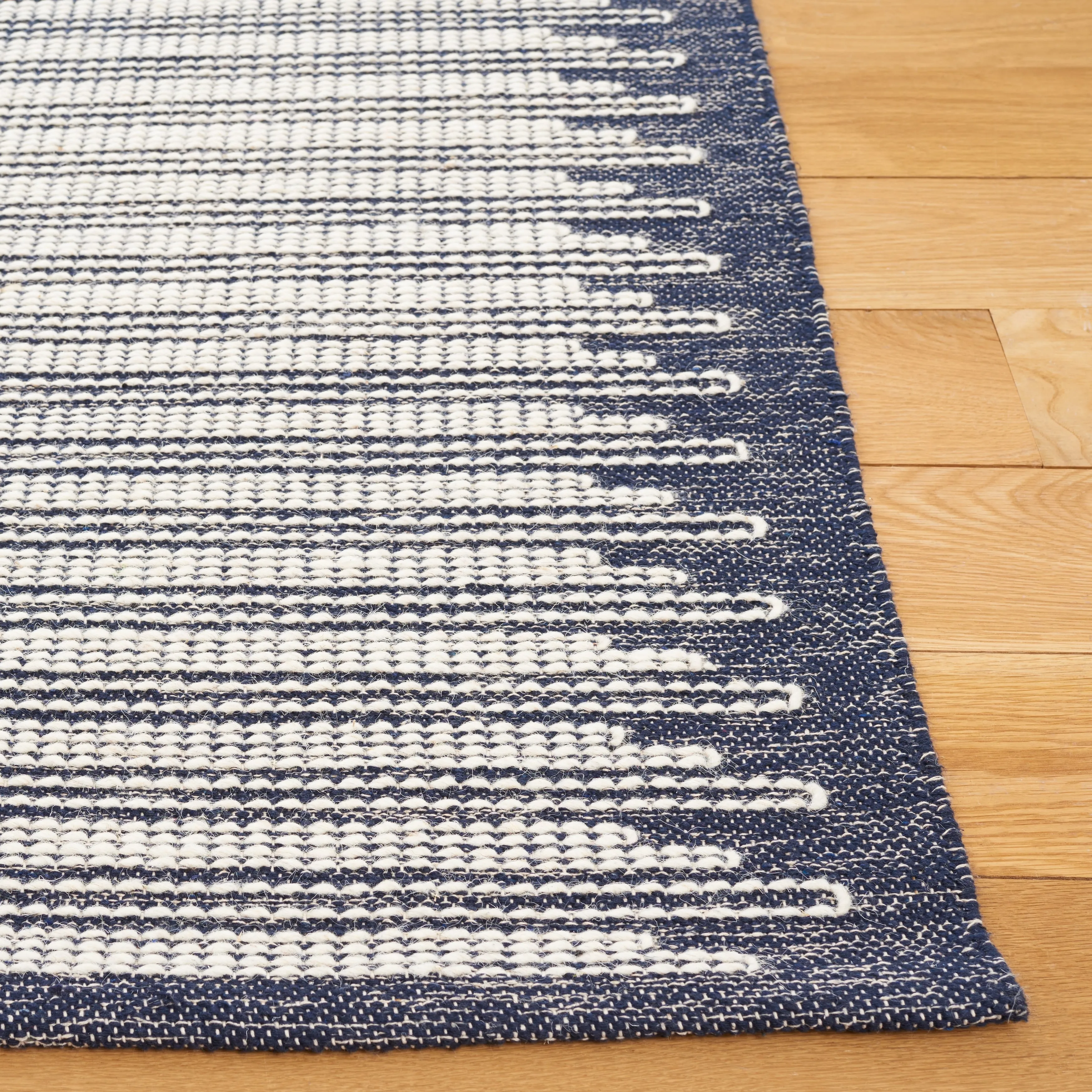 SAFAVIEH Handmade Ebony Cheol Modern Wool Rug