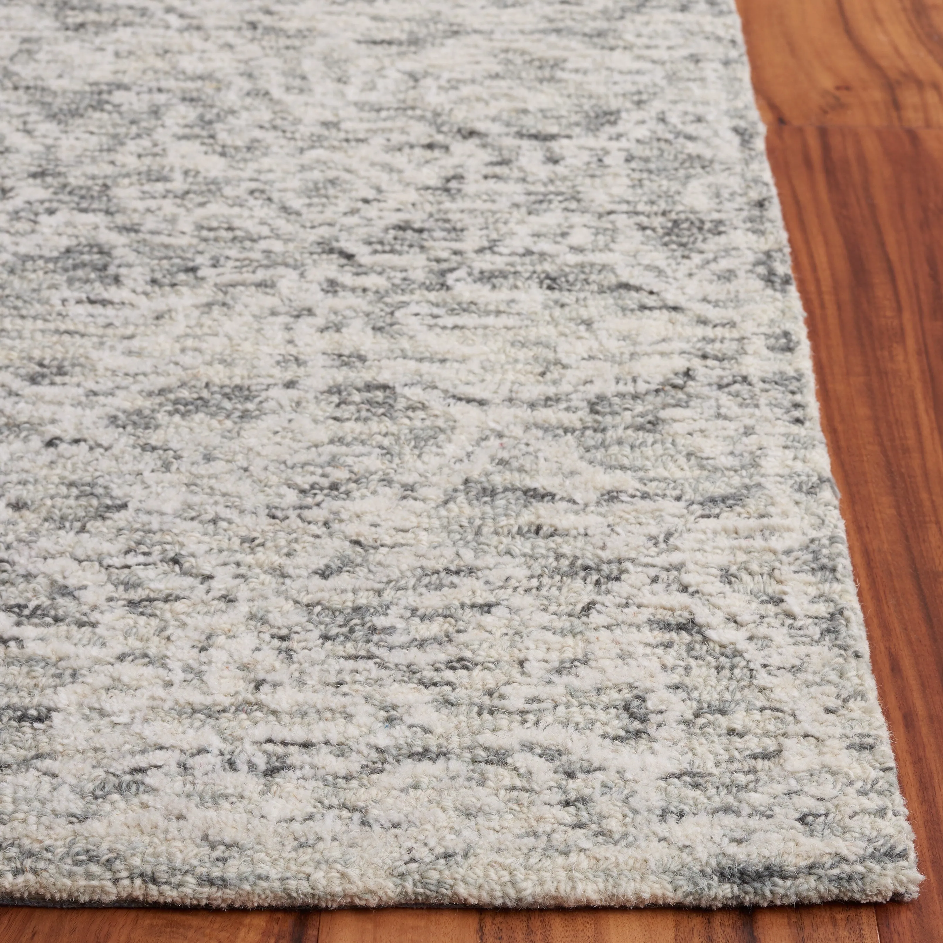 SAFAVIEH Handmade Ebony Ferencne Modern Wool Rug