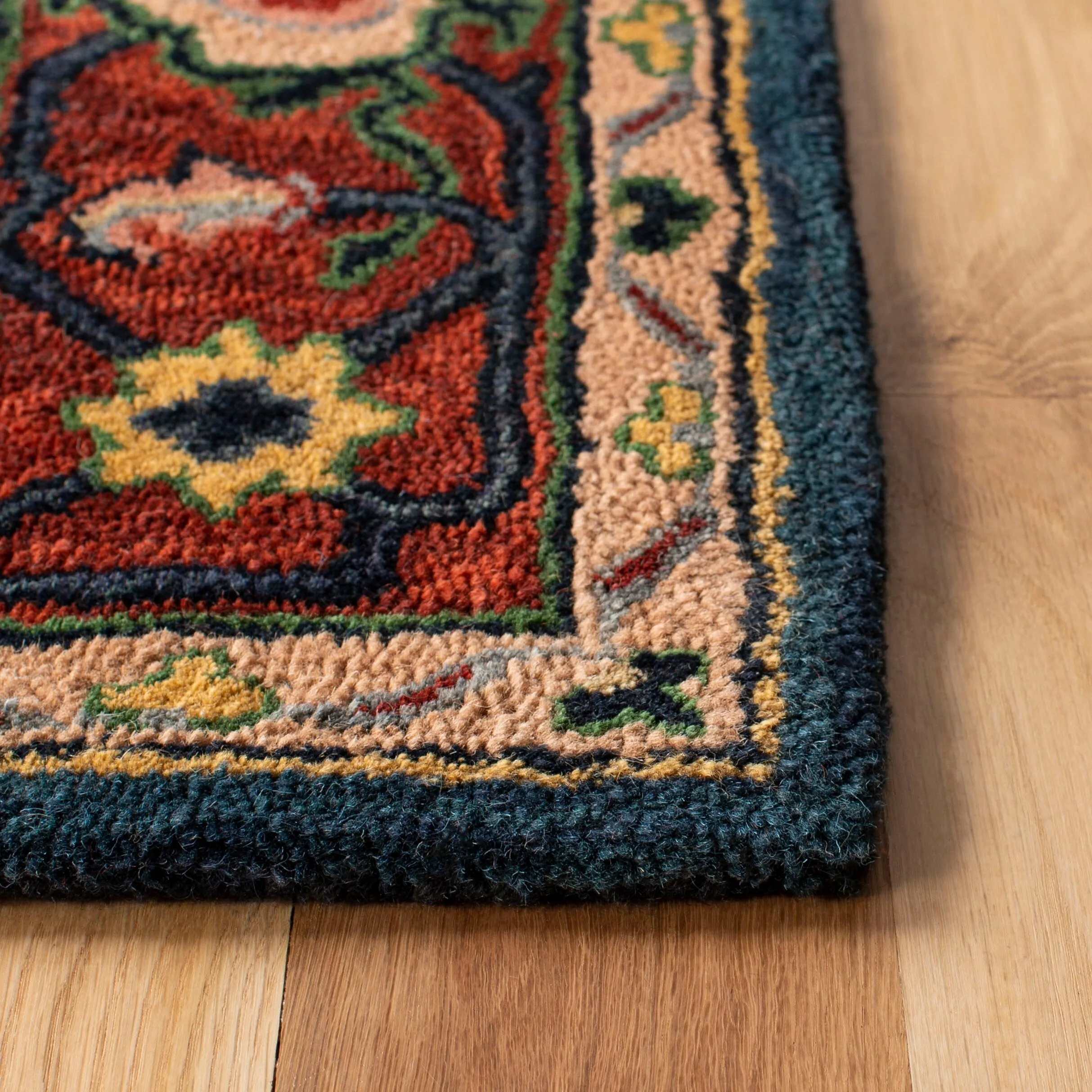 SAFAVIEH Handmade Heritage Facet Border Traditional Wool Rug