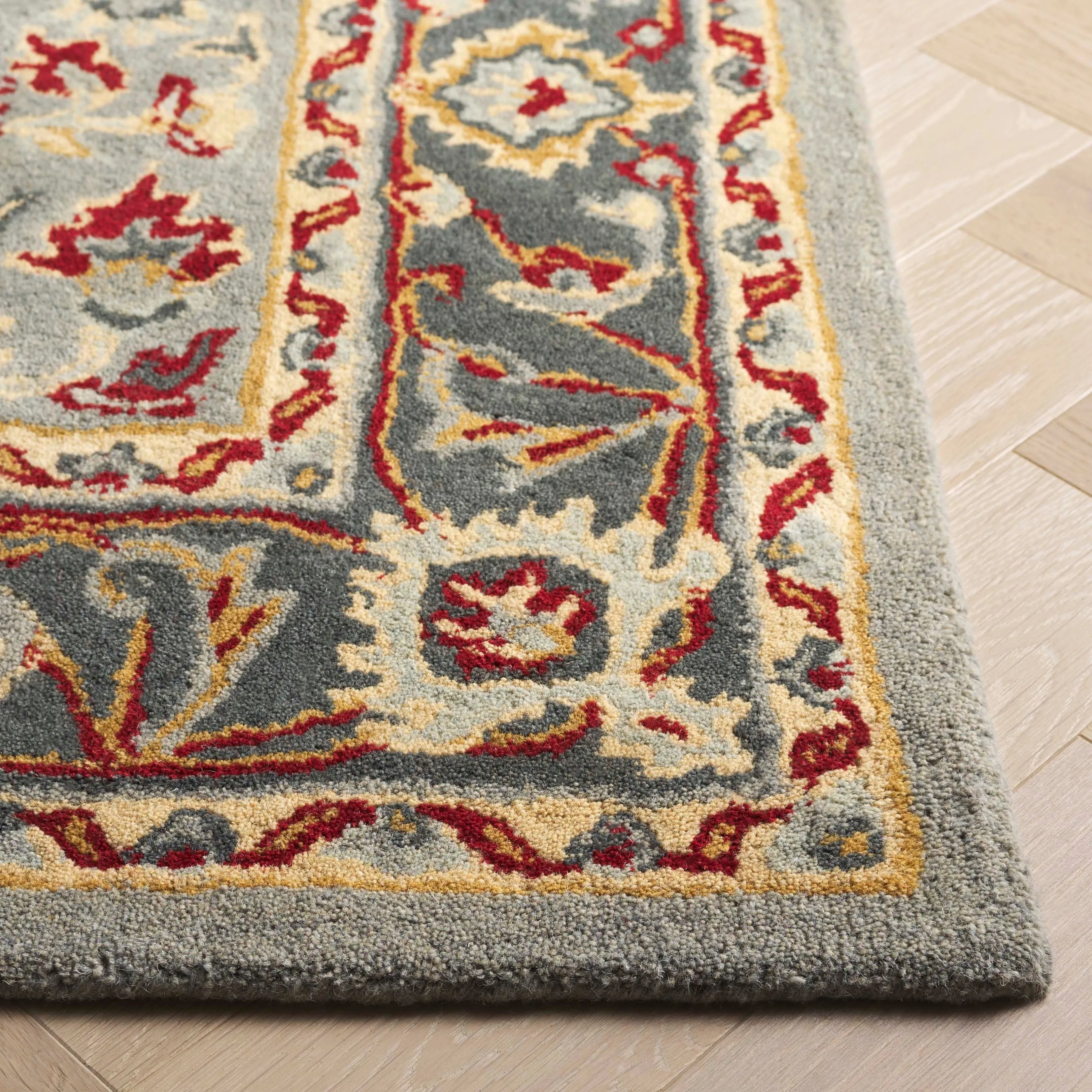 SAFAVIEH Handmade Heritage Leaf Stamp Traditional Wool Rug