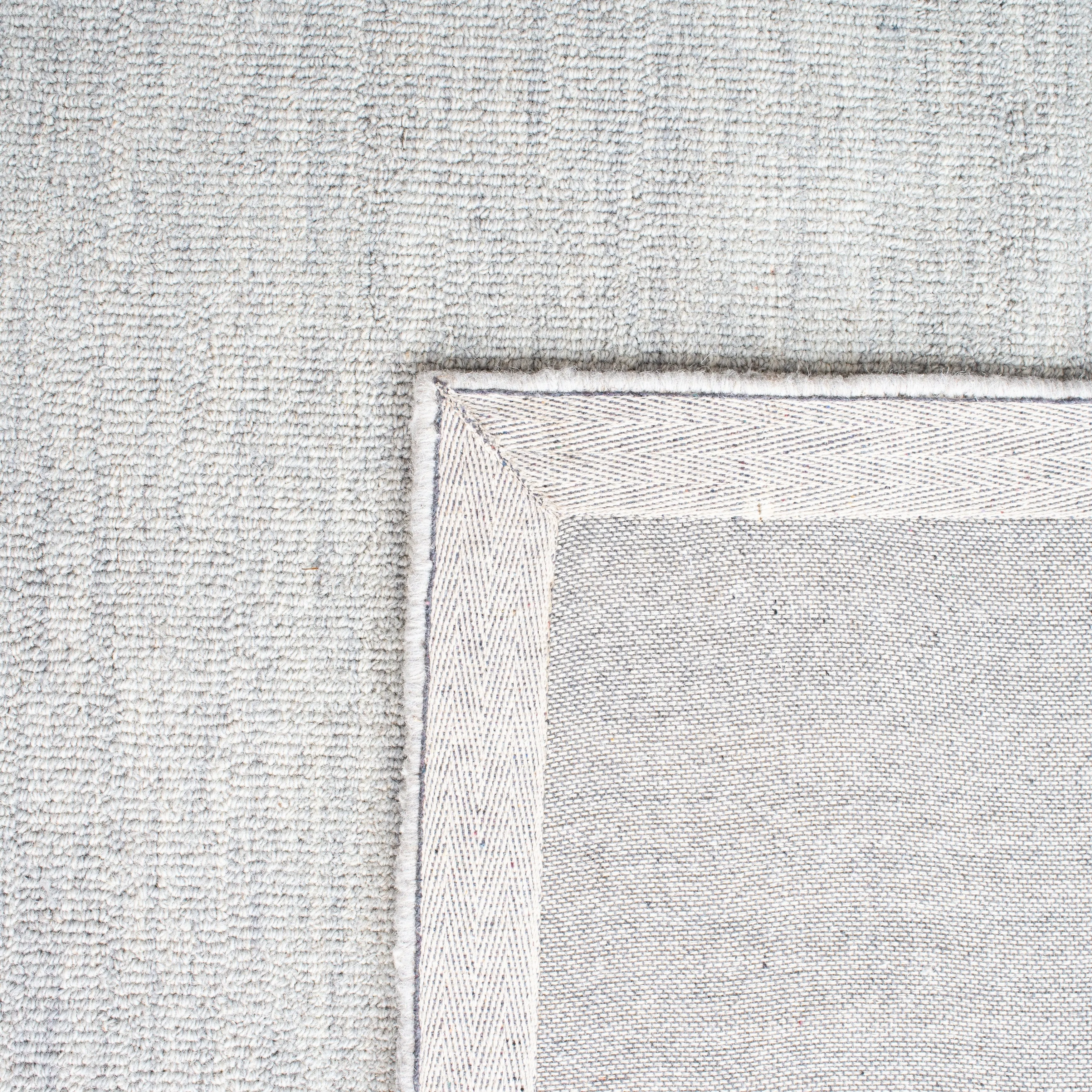 SAFAVIEH Handmade Metro Baudilia Stripe Wool Rug