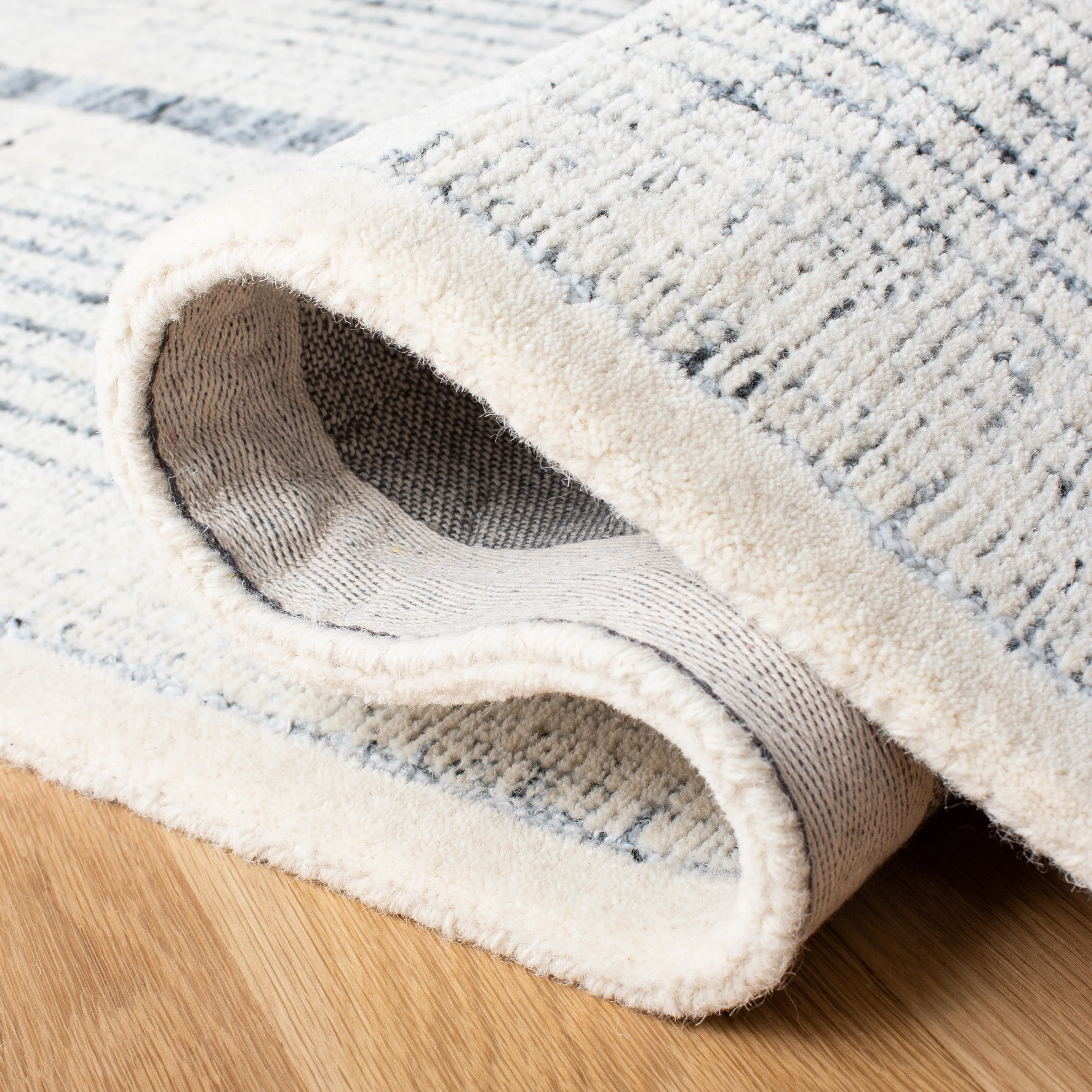 SAFAVIEH Handmade Metro Joele Modern Wool Rug