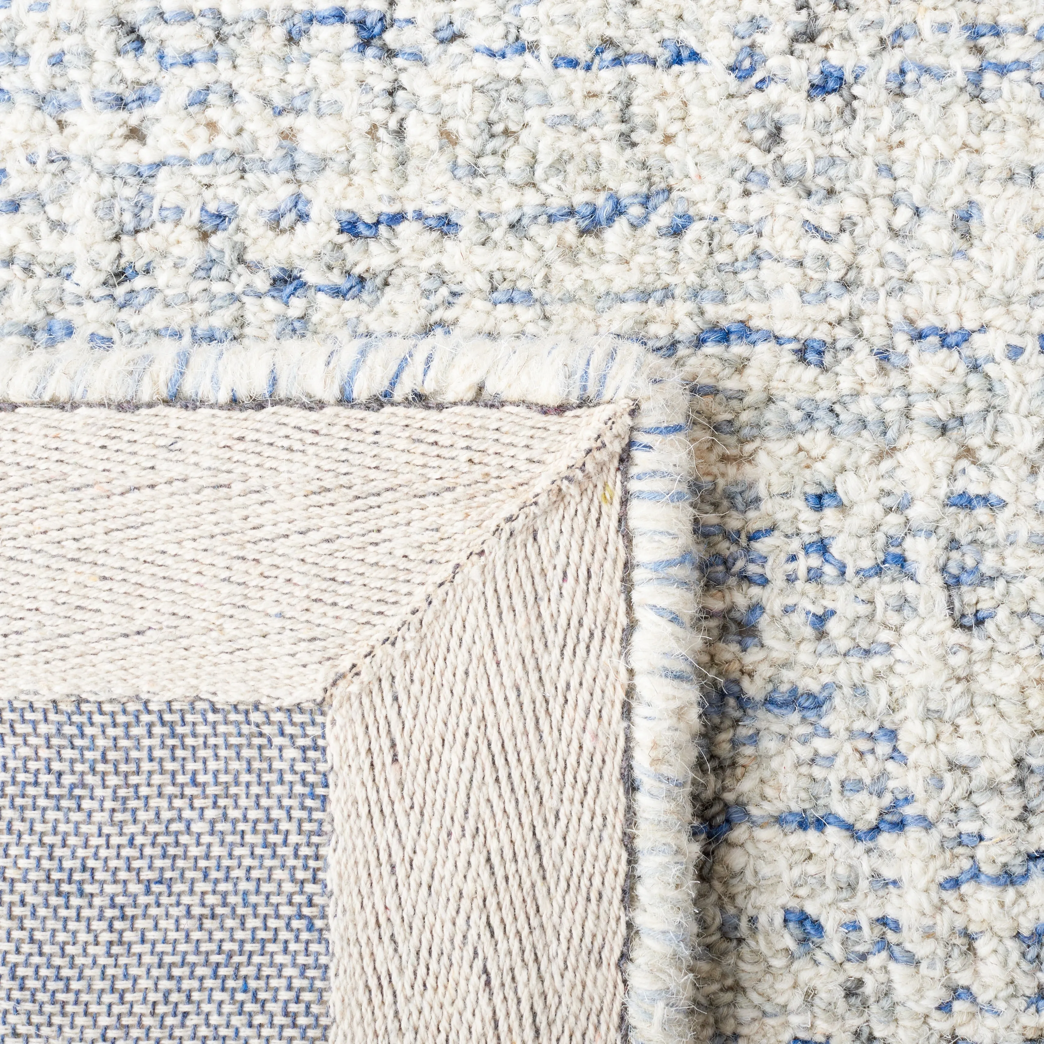 SAFAVIEH Handmade Metro Nunu Wool Rug