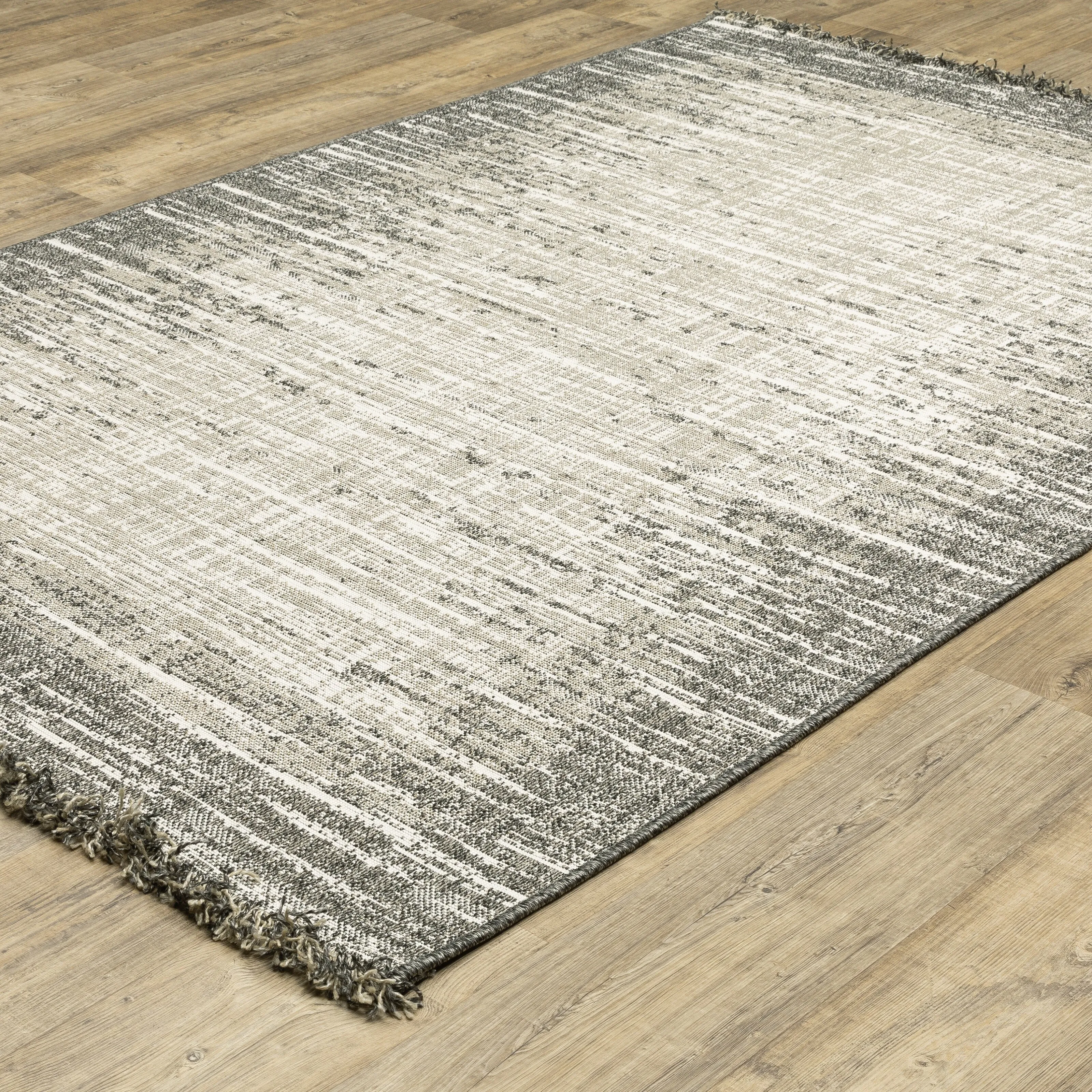 Style Haven Grayton Weathered Textures Beige/ Black Indoor-Outdoor Fringe Edge Rug