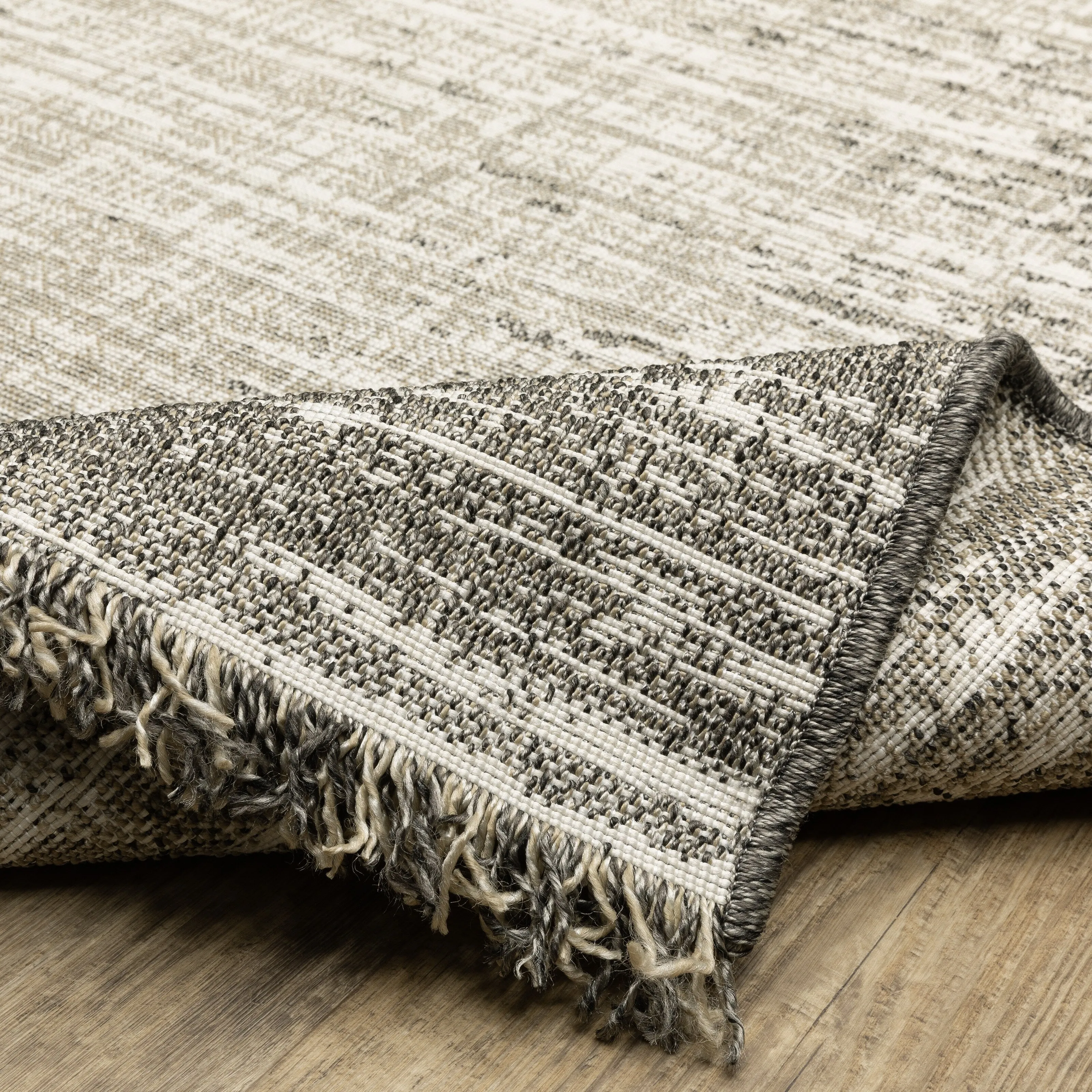 Style Haven Grayton Weathered Textures Beige/ Black Indoor-Outdoor Fringe Edge Rug