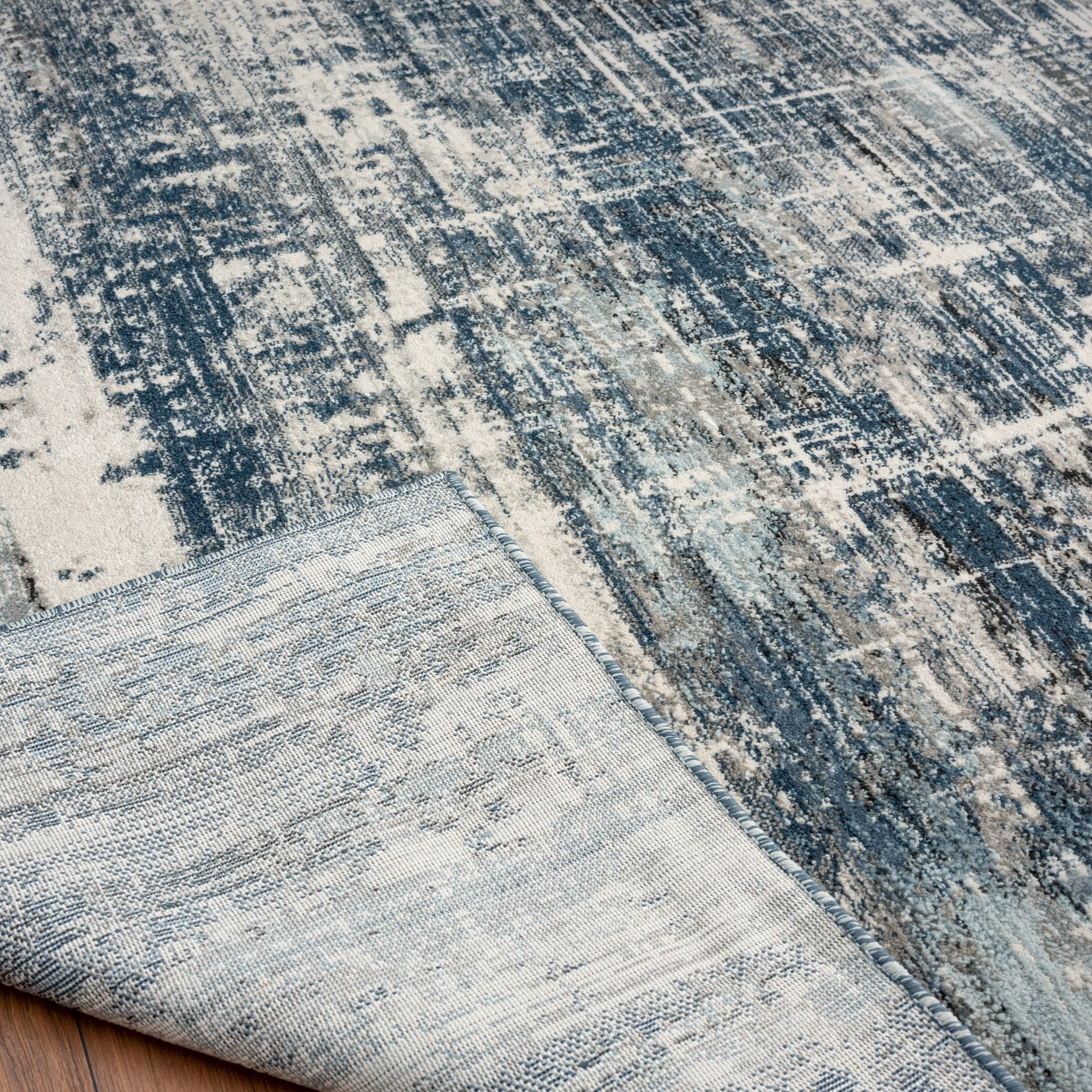 Theory Distressed Denim Blues / Greys Abstract Area Rug