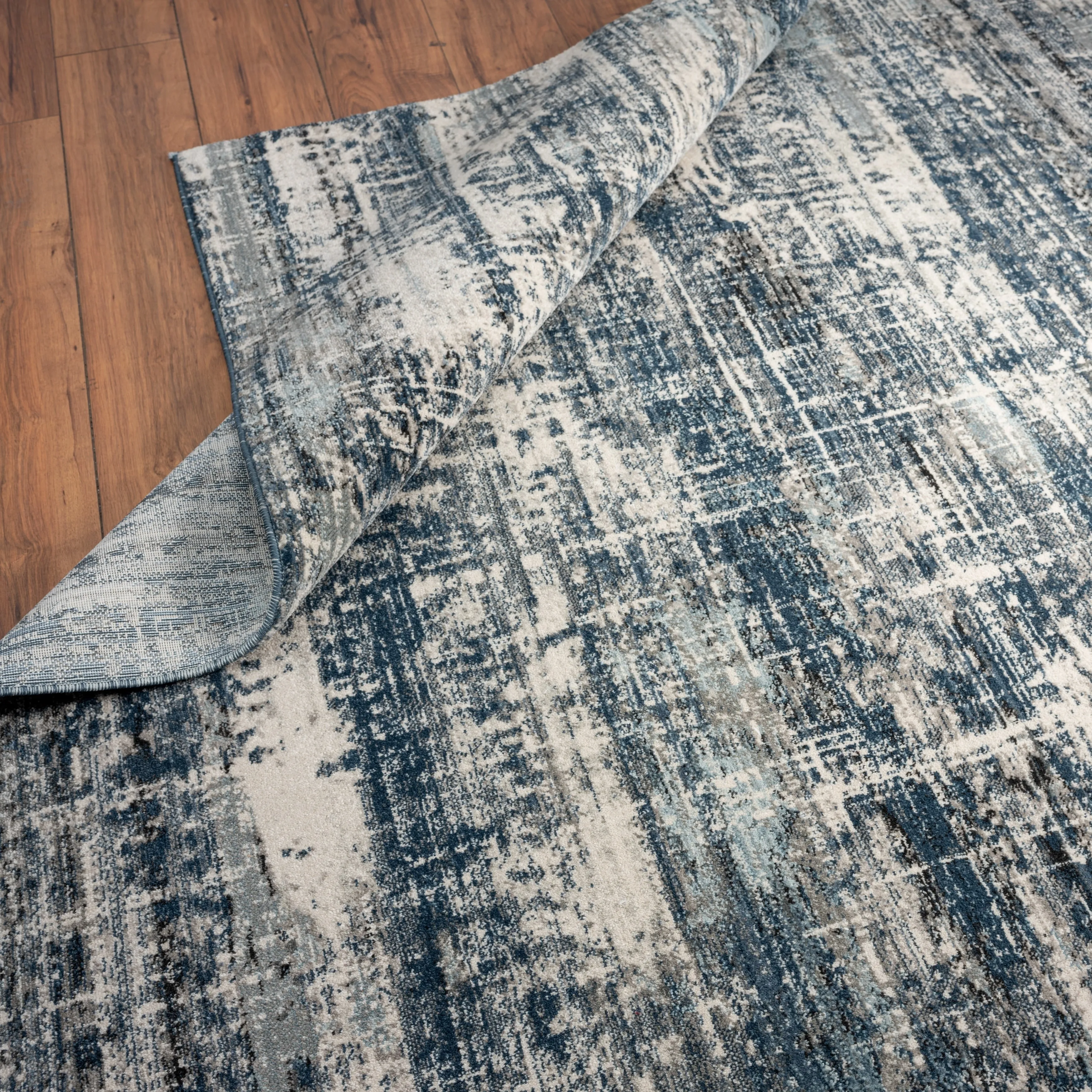 Theory Distressed Denim Blues / Greys Abstract Area Rug